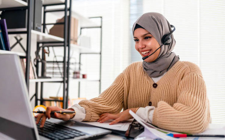 Young woman using a headset
